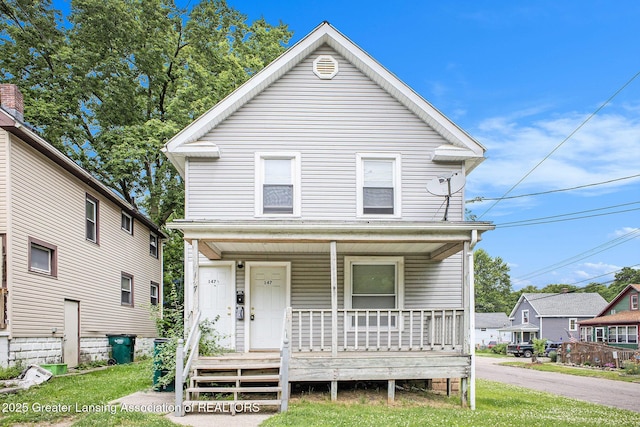 147 Isbell St, Lansing, MI 48910 - view of front of property with a porch