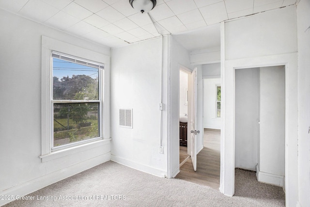 147 Isbell St, Lansing, MI 48910 - unfurnished bedroom featuring carpet and baseboards