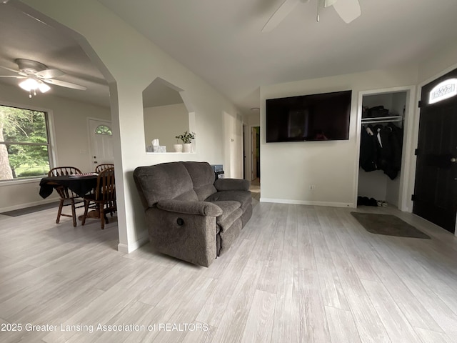 4175 Marshall Rd, Charlotte, MI 48813 - living area featuring ceiling fan and light wood finished floors
