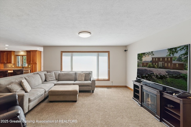 4084 Hulett Rd, Okemos, MI 48864 - living room with light colored carpet, a textured ceiling, and recessed lighting