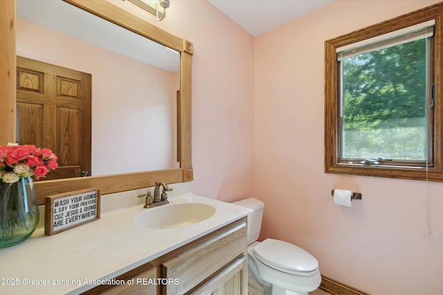 4084 Hulett Rd, Okemos, MI 48864 - bathroom with toilet and vanity