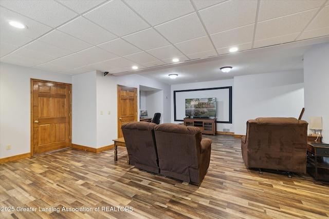 4084 Hulett Rd, Okemos, MI 48864 - living area with wood finished floors, recessed lighting, and a paneled ceiling