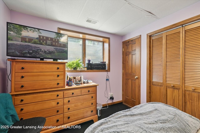 4084 Hulett Rd, Okemos, MI 48864 - carpeted bedroom with baseboards