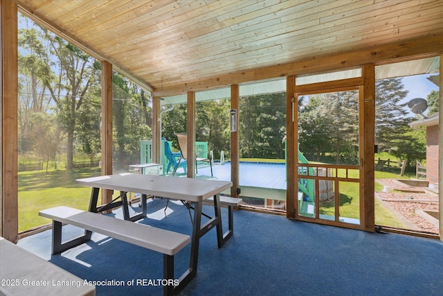 4084 Hulett Rd, Okemos, MI 48864 - sunroom featuring view of scattered trees