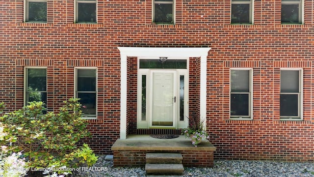 4084 Hulett Rd, Okemos, MI 48864 - entrance to property featuring brick siding