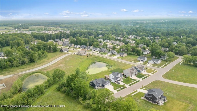 11167 Windswept Dr, Grand Ledge, MI 48837 - aerial view of residential area featuring a large body of water