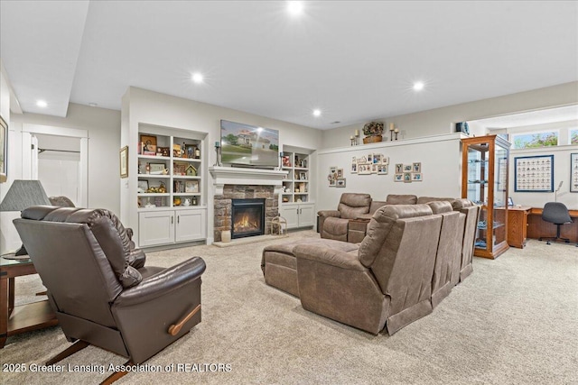 11167 Windswept Dr, Grand Ledge, MI 48837 - living room featuring carpet flooring, recessed lighting, and a fireplace