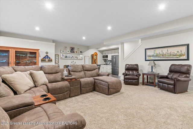 11167 Windswept Dr, Grand Ledge, MI 48837 - carpeted living room with a bar and recessed lighting
