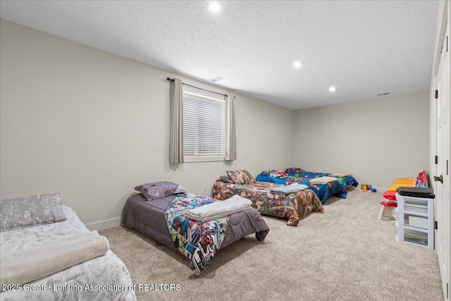 11167 Windswept Dr, Grand Ledge, MI 48837 - bedroom with carpet floors, recessed lighting, and a textured ceiling
