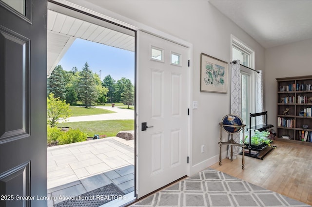 2605 College Rd, Holt, MI 48842 - entrance foyer featuring wood finished floors and baseboards