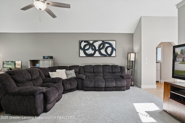 2605 College Rd, Holt, MI 48842 - carpeted living area with ceiling fan and vaulted ceiling