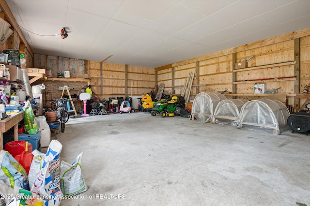 2605 College Rd, Holt, MI 48842 - garage with wood walls
