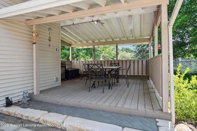 2605 College Rd, Holt, MI 48842 - wooden deck with outdoor dining space