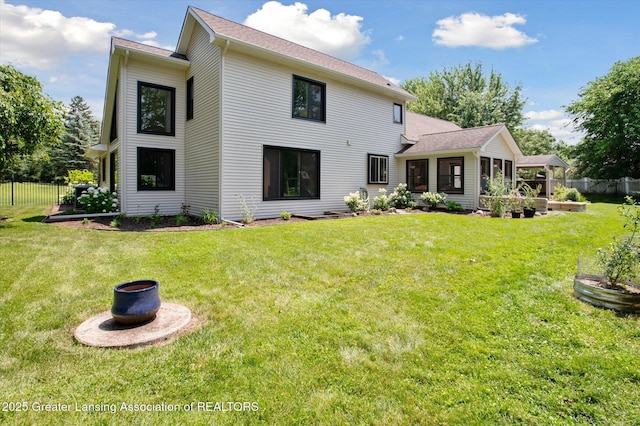 2605 College Rd, Holt, MI 48842 - rear view of house