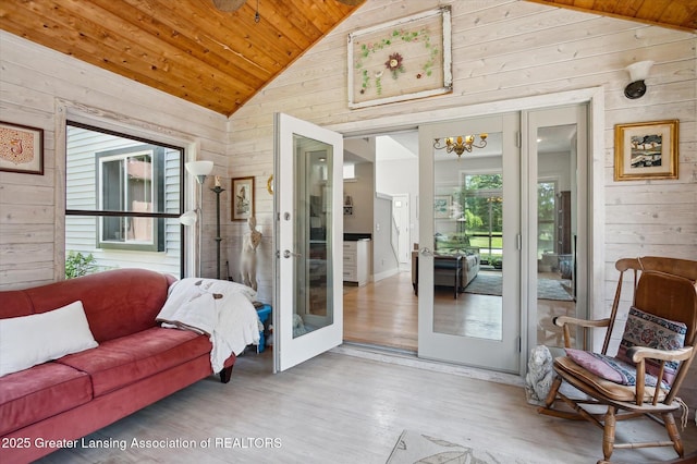 2605 College Rd, Holt, MI 48842 - sunroom / solarium featuring vaulted ceiling and a chandelier