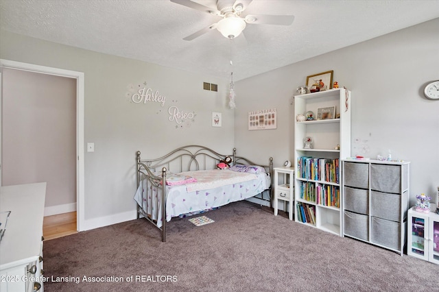 2605 College Rd, Holt, MI 48842 - bedroom with carpet flooring, a ceiling fan, and a textured ceiling
