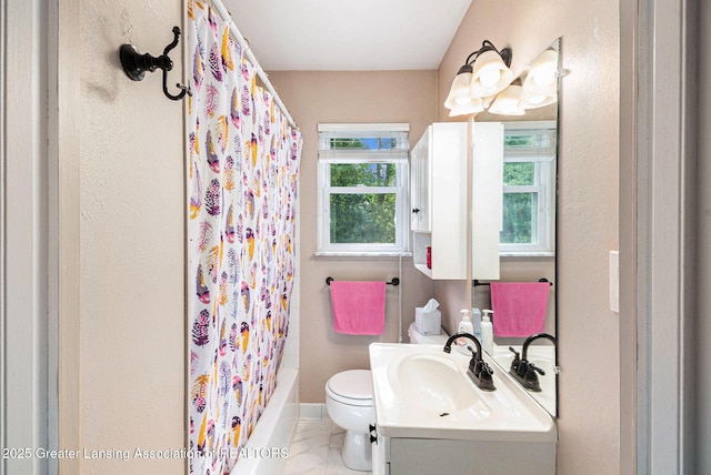 1614 N Eifert Rd, Holt, MI 48842 - bathroom featuring vanity, marble finish floors, and shower / bathtub combination with curtain