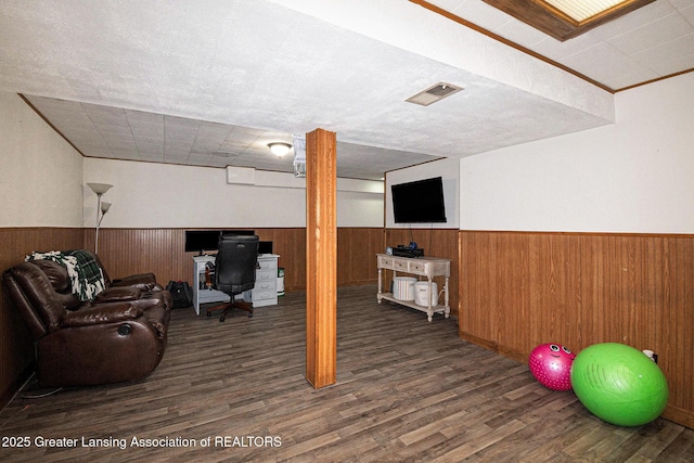 1614 N Eifert Rd, Holt, MI 48842 - finished basement with a wainscoted wall, wood finished floors, wood walls, and an office area