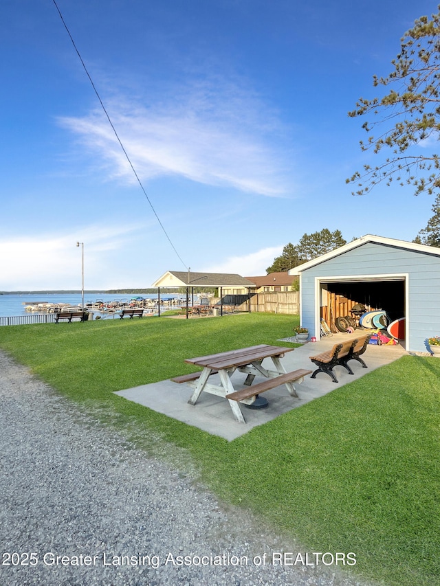 103 Norway Rd, Roscommon, MI 48653 - view of community with a detached garage and an outbuilding