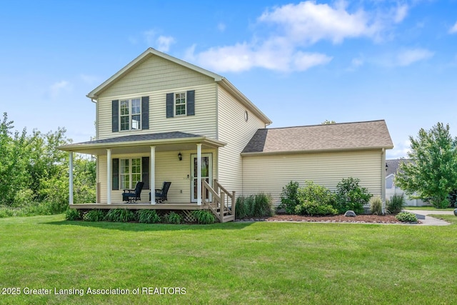 774 Tims View St, Potterville, MI 48876 - view of front facade with a front lawn and covered porch