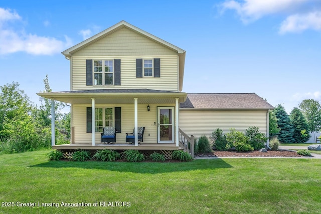 774 Tims View St, Potterville, MI 48876 - traditional-style house with a front yard and covered porch