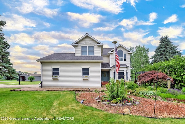 13689 Oneida Rd, Grand Ledge, MI 48837 - traditional home featuring a front yard