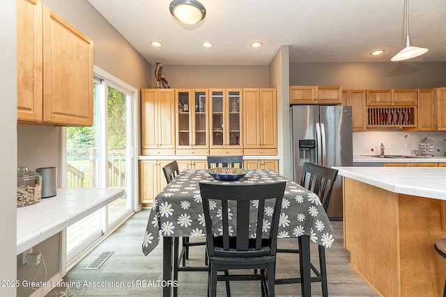 13689 Oneida Rd, Grand Ledge, MI 48837 - dining room featuring light wood-style flooring and recessed lighting
