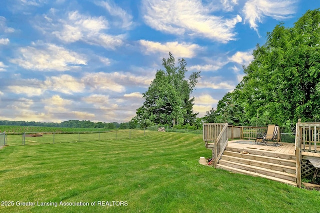 13689 Oneida Rd, Grand Ledge, MI 48837 - view of yard with a wooden deck and a view of countryside