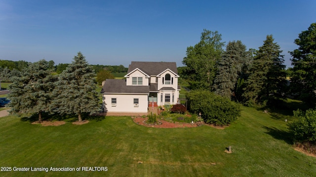 13689 Oneida Rd, Grand Ledge, MI 48837 - traditional-style home with a front lawn
