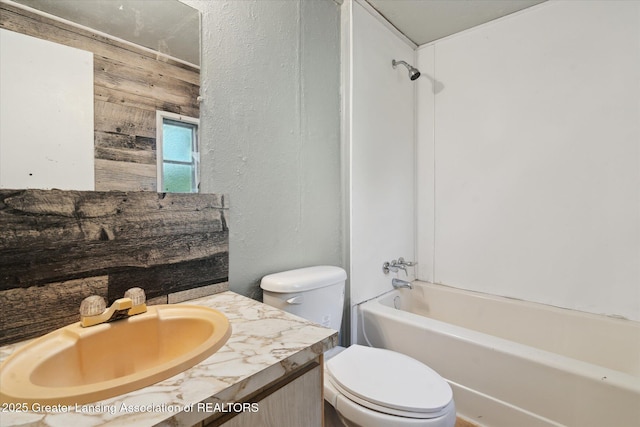 27508 F Dr S, Albion, MI 49224 - full bath with vanity, bathing tub / shower combination, a textured wall, and wooden walls