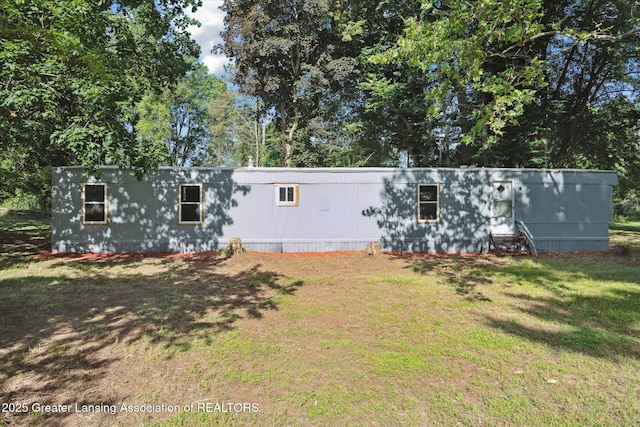 27508 F Dr S, Albion, MI 49224 - back of property featuring a yard and view of scattered trees