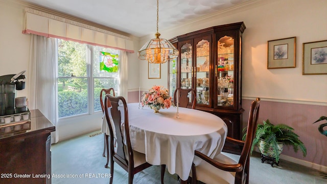 3888 Breckinridge Dr, Okemos, MI 48864 - dining space with a chandelier, carpet flooring, healthy amount of natural light, and crown molding