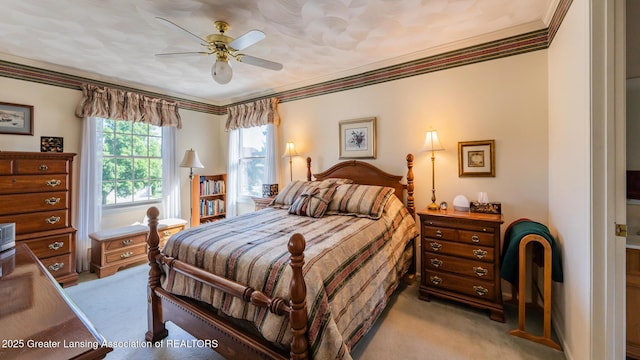 3888 Breckinridge Dr, Okemos, MI 48864 - bedroom with light colored carpet, ornamental molding, and ceiling fan