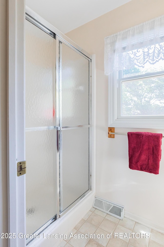 3888 Breckinridge Dr, Okemos, MI 48864 - bathroom with a shower stall and tile patterned flooring