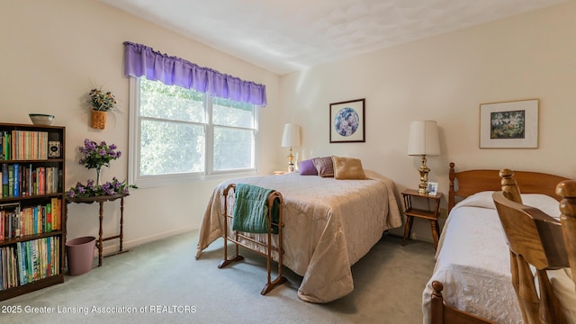 3888 Breckinridge Dr, Okemos, MI 48864 - bedroom featuring carpet and baseboards