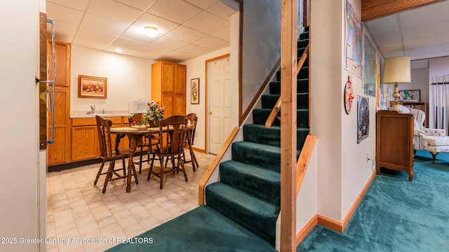 3888 Breckinridge Dr, Okemos, MI 48864 - stairs featuring a drop ceiling and carpet floors