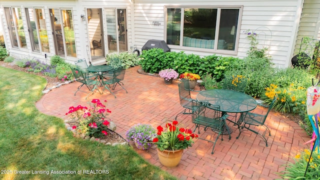 3888 Breckinridge Dr, Okemos, MI 48864 - view of patio featuring outdoor dining area and area for grilling