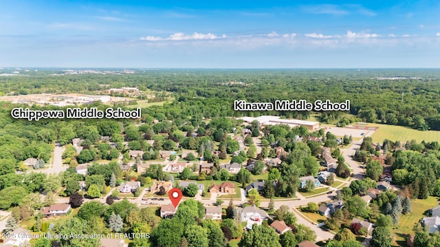 3888 Breckinridge Dr, Okemos, MI 48864 - aerial view of property and surrounding area with a heavily wooded area