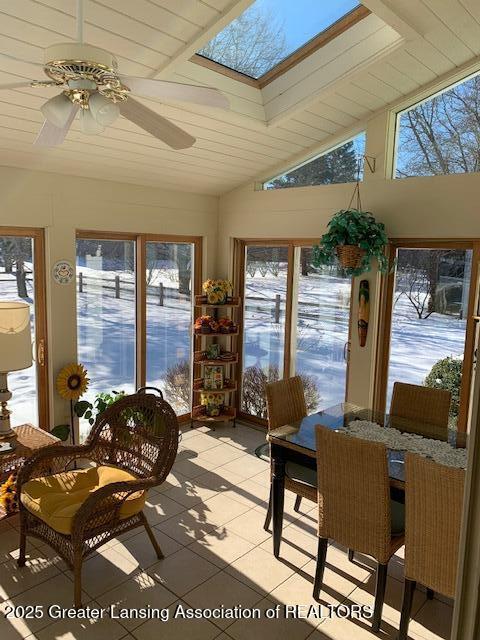 3888 Breckinridge Dr, Okemos, MI 48864 - sunroom featuring plenty of natural light, a skylight, and tile patterned floors
