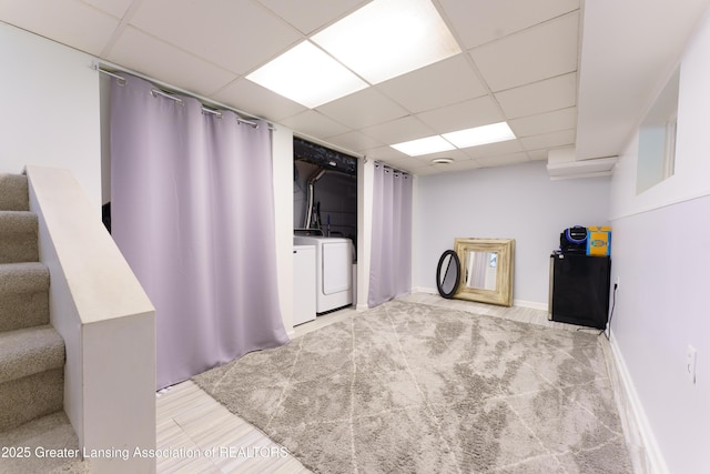 2162 Kent St, Okemos, MI 48864 - misc room with separate washer and dryer, a drop ceiling, and stairs
