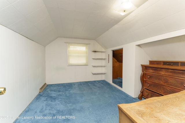 2162 Kent St, Okemos, MI 48864 - additional living space with carpet flooring, lofted ceiling, and wood walls