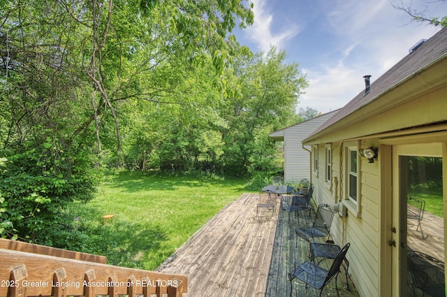 2162 Kent St, Okemos, MI 48864 - view of grassy yard with a deck