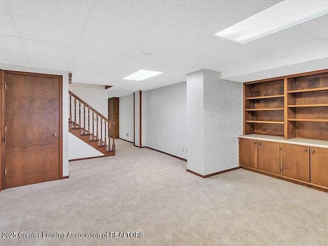 3619 W Arbutus Dr, Okemos, MI 48864 - finished basement featuring stairs and light colored carpet
