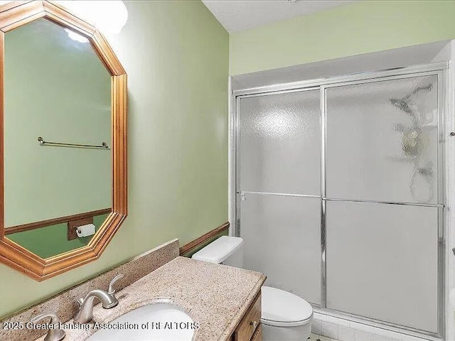 3619 W Arbutus Dr, Okemos, MI 48864 - bathroom featuring vanity and a shower stall