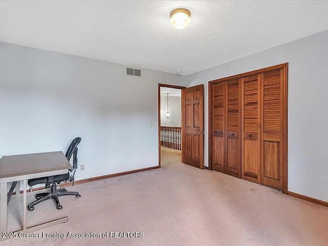 3619 W Arbutus Dr, Okemos, MI 48864 - office space featuring a textured ceiling and light carpet