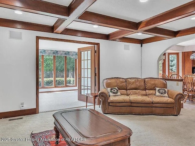 3619 W Arbutus Dr, Okemos, MI 48864 - carpeted living room with arched walkways, beam ceiling, coffered ceiling, and recessed lighting