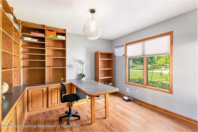 12829 Silver Ridge Dr, Grand Ledge, MI 48837 - office space featuring light wood-style flooring and baseboards