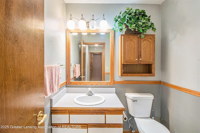 12829 Silver Ridge Dr, Grand Ledge, MI 48837 - bathroom featuring toilet and vanity
