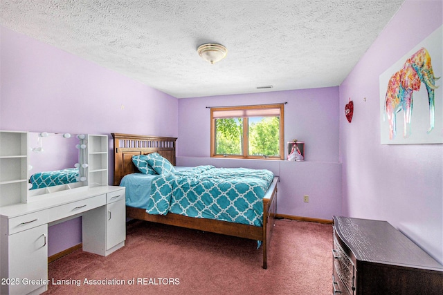 12829 Silver Ridge Dr, Grand Ledge, MI 48837 - carpeted bedroom featuring a textured ceiling