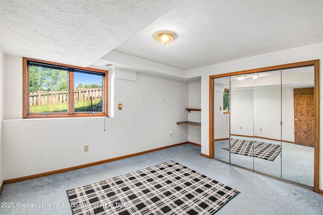 12829 Silver Ridge Dr, Grand Ledge, MI 48837 - carpeted spare room with healthy amount of natural light and a textured ceiling